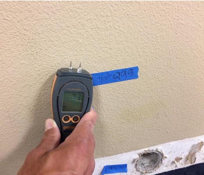 Moisture meter shows wall is now dry
