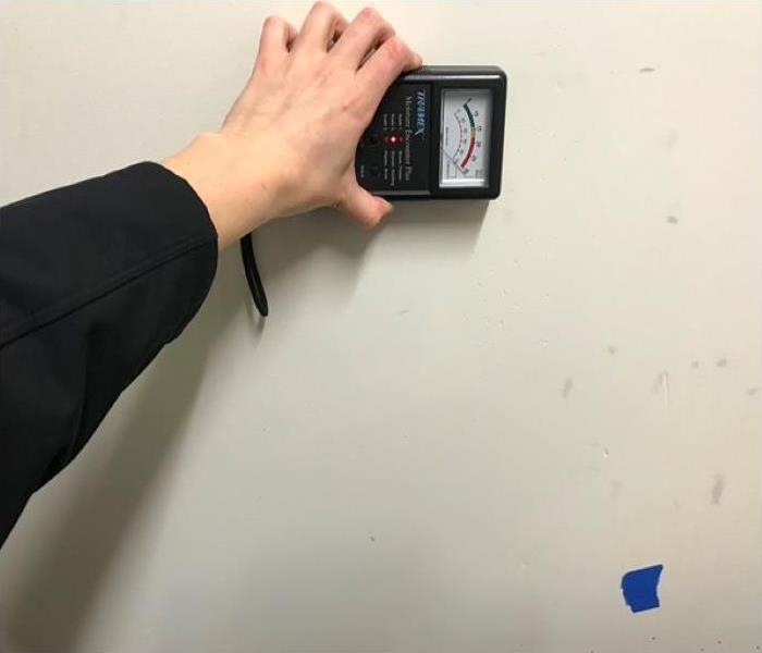Moisture Meters shows wet drywall well above marked waterline